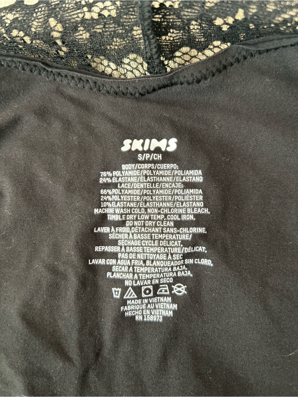 SKIMS Fits Everybody Lace Cami Thong Bodysuit in Onyx - Picture 8 of 9